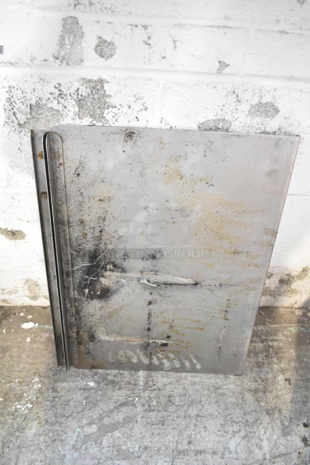 "ALL ONE MONEY! Tier lot of metal pieces including a large, rusted metal sheet with visible surface wear and imperfections."