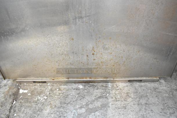 "Lot of metal pieces with visible wear, including a rust-stained metal panel; blue poly rack included in lot."