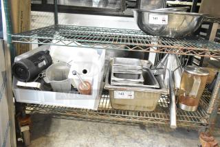 Tiered lot with drop-in bins, beverage dispenser, trays, kitchen tools on metal shelving. Labels: Lot 141, 143. Used condition.