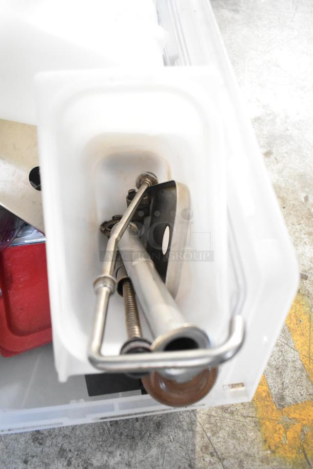 Tier lot with various items including drop-in bins and a beverage dispenser. Items show signs of use; ideal for bulk purchase.