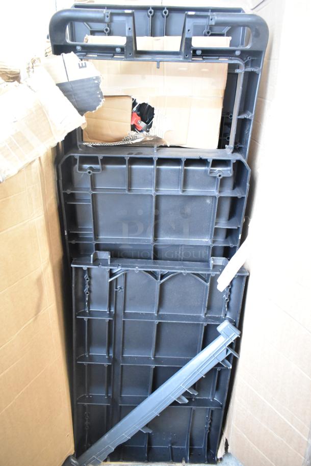 Rubbermaid 2202527 Housekeeping Cart, full size, black plastic, scratch and dent condition, with accessory bundle.