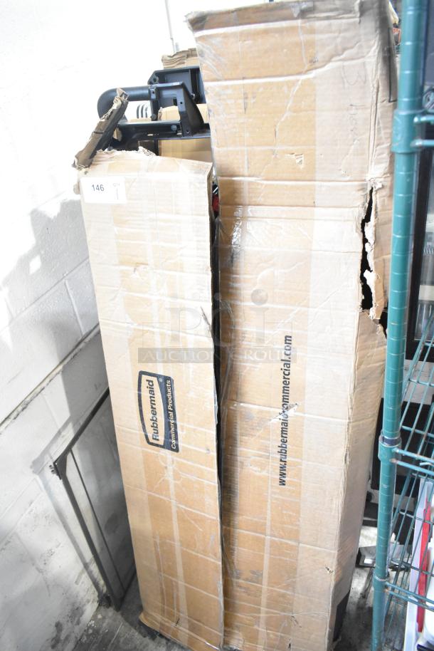 Rubbermaid® 2202527 full-size housekeeping cart in original, slightly damaged packaging. Includes accessory bundle.