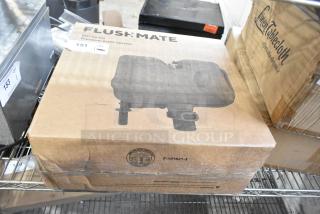 Brand new Flushmate M-101526-F3B 501A/501B 1.6 GPF system, in box, shows minor box wear, with push button feature.