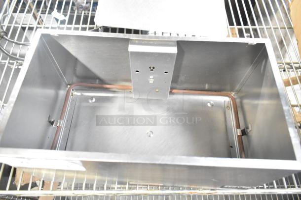 Server DI-2 92020 3 Qt. Double Cone Dip Warmer in stainless steel. 120 Volts, 1 Phase. Interior view showing heating element.