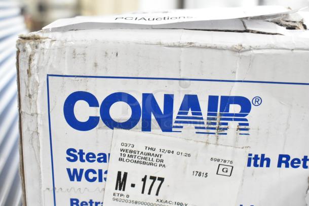 Conair Iron in original packaging with visible wear. Box labeled with "Webstaurant 19 Mitchell Dr Bloomsburg PA."
