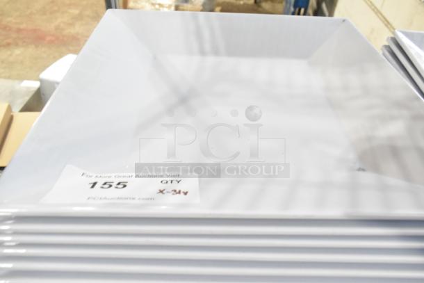 Stack of white plates with label "For More Great Auctions Visit, 155 QTY, X-34, PCIauctions.com." Part of a 31-item lot.