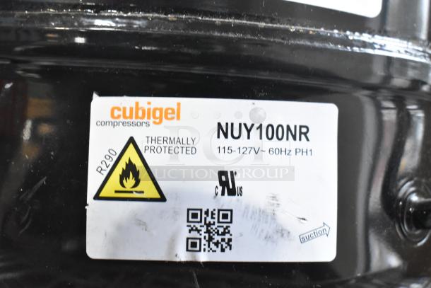 Cubigel NUY100NR motor, 115-127V, 1 phase, thermally protected, R290 refrigerant label, black casing, auction item.