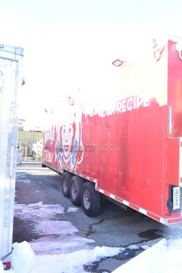 2021 Titanium Cargo 8.5'x28' mobile kitchen trailer, red, triple axle, Wendy's branding, infrastructure intact, no equipment.