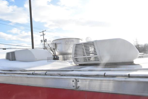2021 Titanium Cargo mobile kitchen trailer rooftop with CaptiveAire grease hood and Coleman Mach A/C unit.