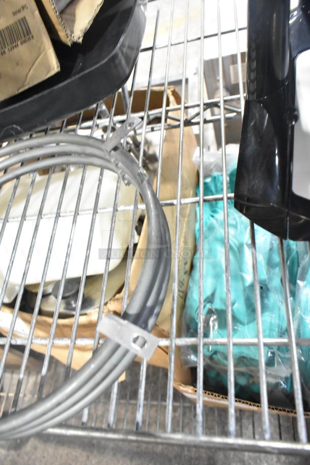 Four assorted items, including Avantco 1782795S start relay, V3007-04 plastic fitting, PRTB-CLACK-AS parts bag on metal shelf.