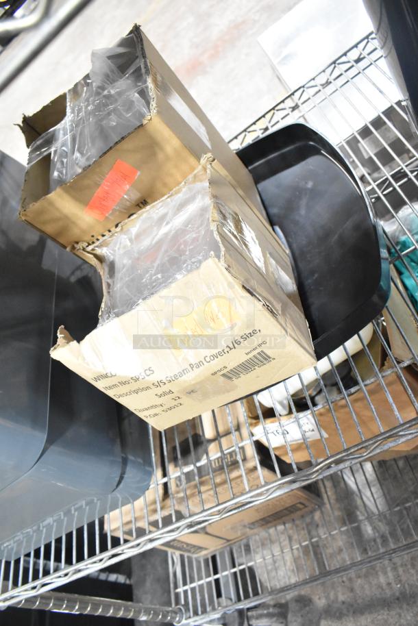6 items, including 3 Gray Slim Jim Trash Can Lids, and SPSCS Winco Steam Pan Lids, displayed on metal shelves.