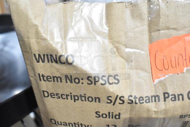 6 items including 3 Gray Slim Jim trash can lids, SPSCS Winco steam pan lids. Item No: SPSCS. Brown packaging visible.