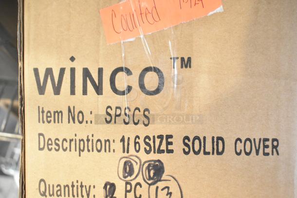 Box labeled "WINCO" containing SPSCS steam pan lids, marked "1/6 size solid cover," includes handwritten inventory note.