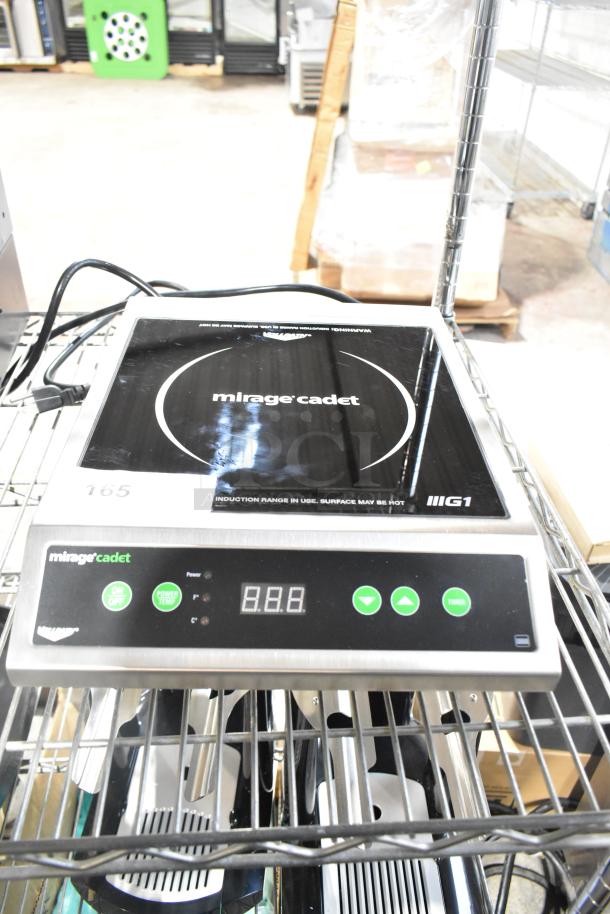 Vollrath 59300 Mirage Cadet induction range, black glass top, digital controls, 120V, 1 phase, excellent condition.