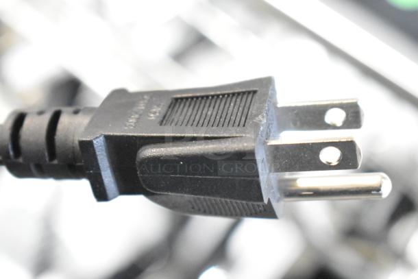 Close-up of a power plug compatible with the Vollrath 59300 Mirage Cadet Induction Range, 120V, 1 Phase.