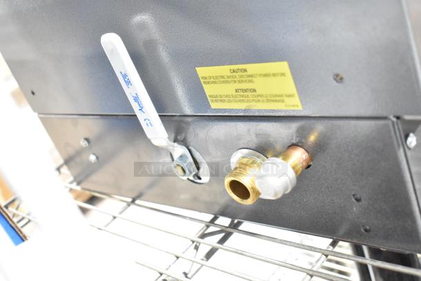 Hatco FR-9B Food Rethermalizer, 480V 3 Phase, features control valve and caution label detailing electric shock risk.