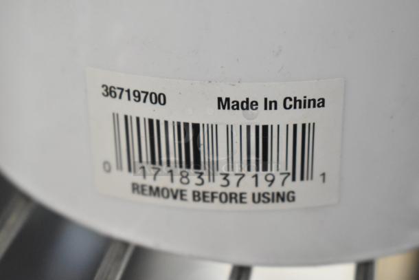 Close-up of a barcode label on a white background with "Made in China" text and the number 36719700.
