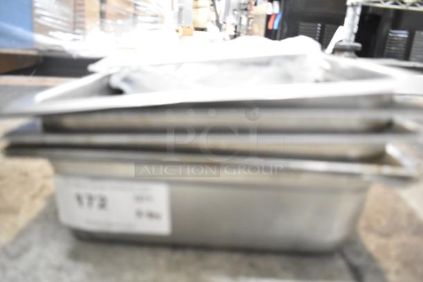 Stainless steel drop-in bins and brew basket set, includes 10 items, gently used, bid multiplies by 10.