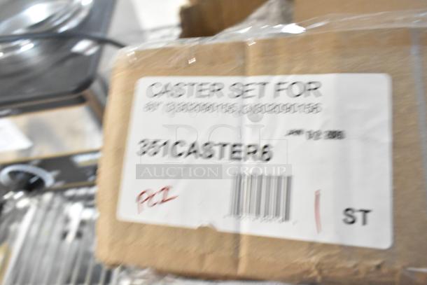 Brand new Cooking Performance Group 351CASTER6 casters, 4 3/4", set of 6. Box label reads "Caster Set For" with a barcode.
