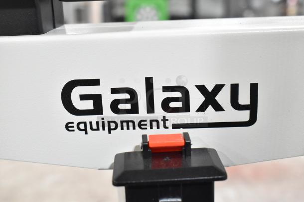 Galaxy floor style scale, featuring a sturdy white frame with "Galaxy equipment" logo in black text, prominent and functional design.