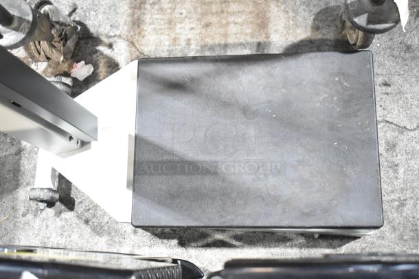 Galaxy Floor Style Scale, sturdy metal frame with a textured platform, visible wear indicating used condition.