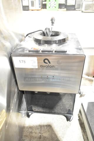 Avalon A11-CTTL countertop water cooler, top loading, 115 volts, 1 phase, with visible indicator lights and plug.
