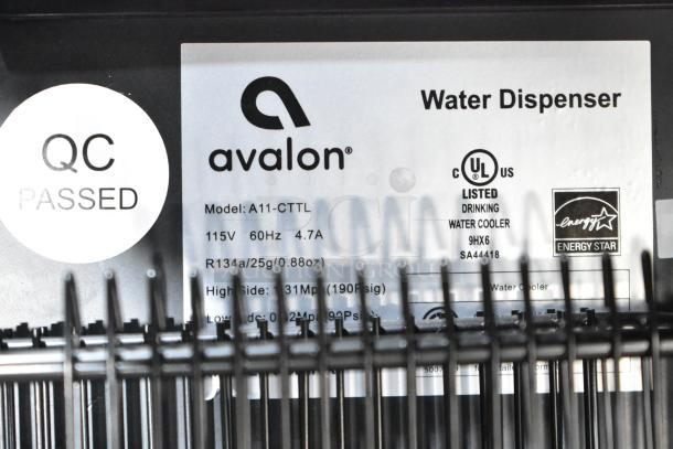 Avalon A11-CTTL countertop water cooler label showing model details, 115V, Energy Star rating, and QC passed mark.