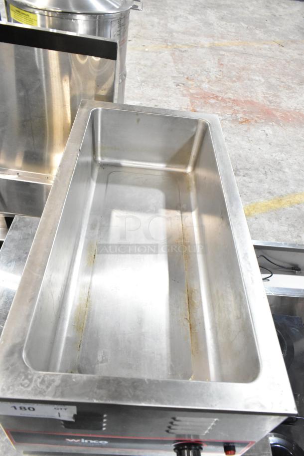 Winco FW-L600 Countertop Food Warmer, used condition. Stainless steel, 120 volts, 1 phase. Heat control dial visible.