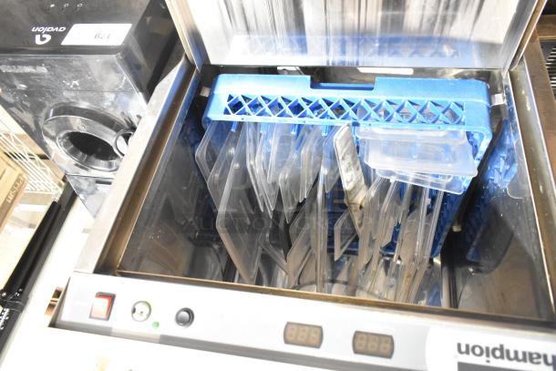 Champion UH130B commercial undercounter dishwasher, open view with blue rack, 120-208/230V, 1 phase, excellent condition.