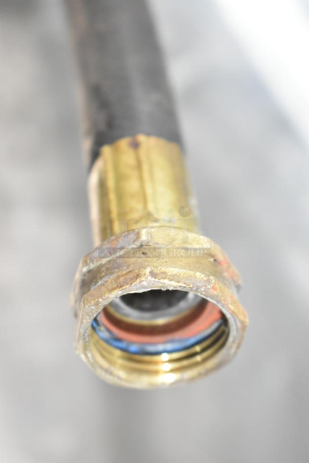 Close-up of a metal fitting from the Champion UH130B Commercial Undercounter Dishwasher.