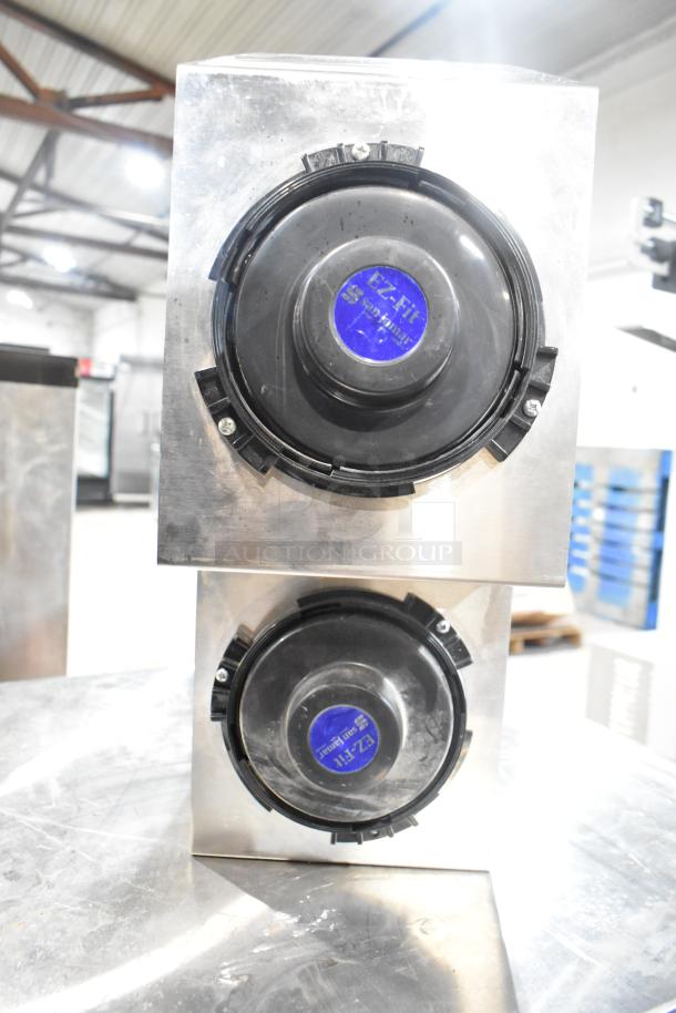 Eagle Holder with 2 San Jamar cup dispenser chutes, metal construction, visible EZ-Fit labels, in good condition.