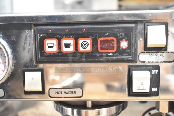 La Marzocco 2 Group Espresso Machine, features control panel, buttons, and steam wands, visible wear, includes 2 portafilters.