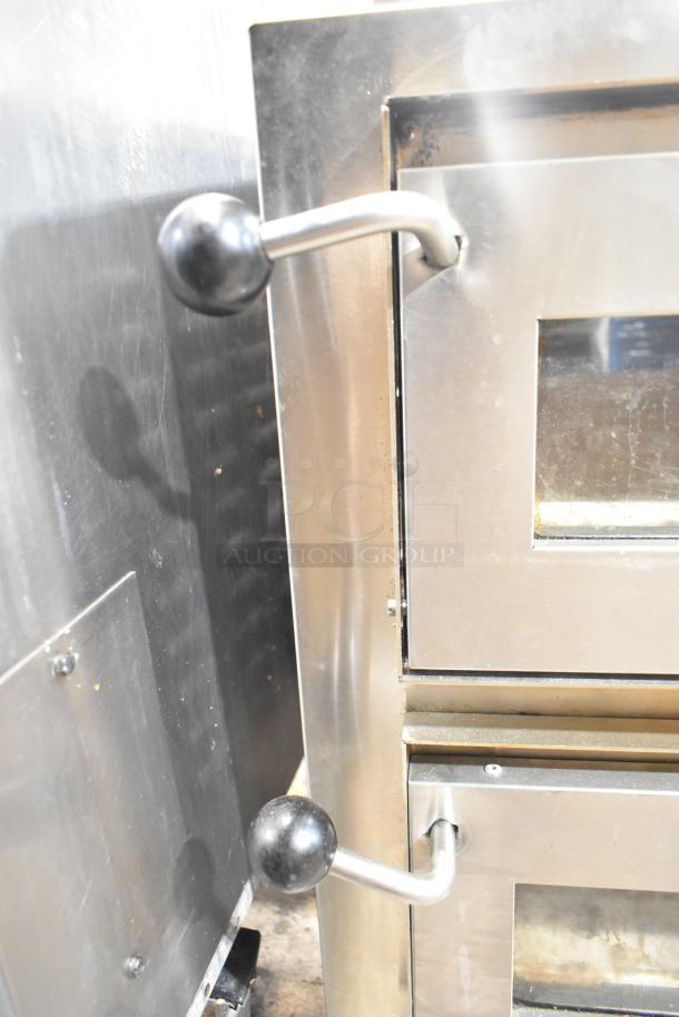 Avantco 177DPO18DD double deck countertop pizza oven, stainless steel, two independent chambers, cooking stones, 240V.