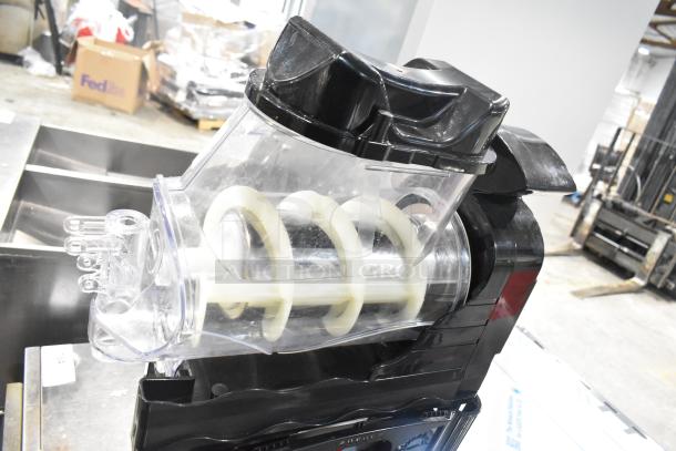 2023 Carnival King Aurora 1 Granita Machine, 1.6-gallon, model 382SMM1, black and clear, excellent condition.