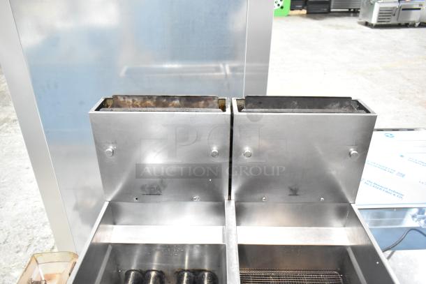 Pitco Frialator SG14-S commercial fryer, 2 bay, 110,000 BTU, stainless steel, good condition, with heating elements visible.