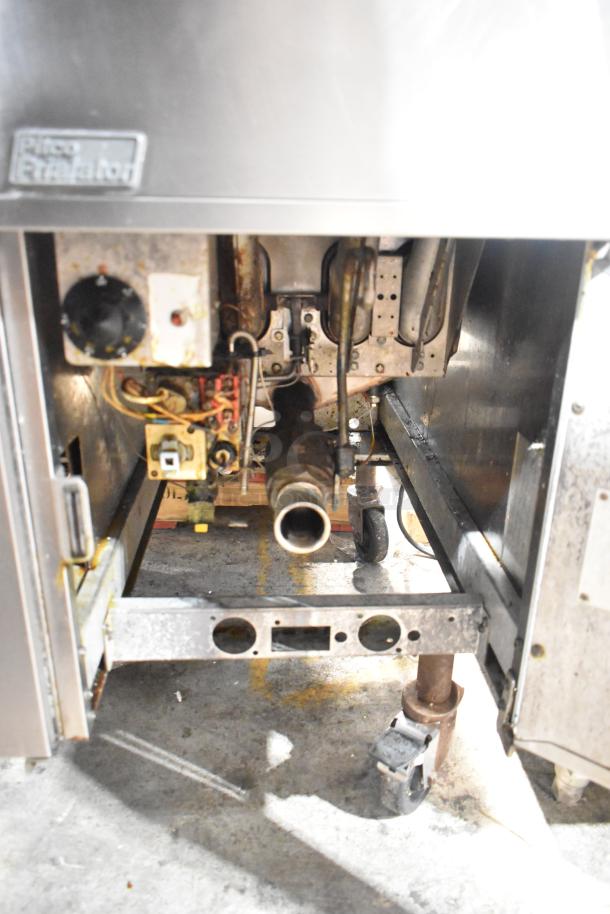 Pitco Frialator SG14-S commercial deep fat fryer, 2 bay, 110,000 BTU, metal construction, visible internal components, fair condition.
