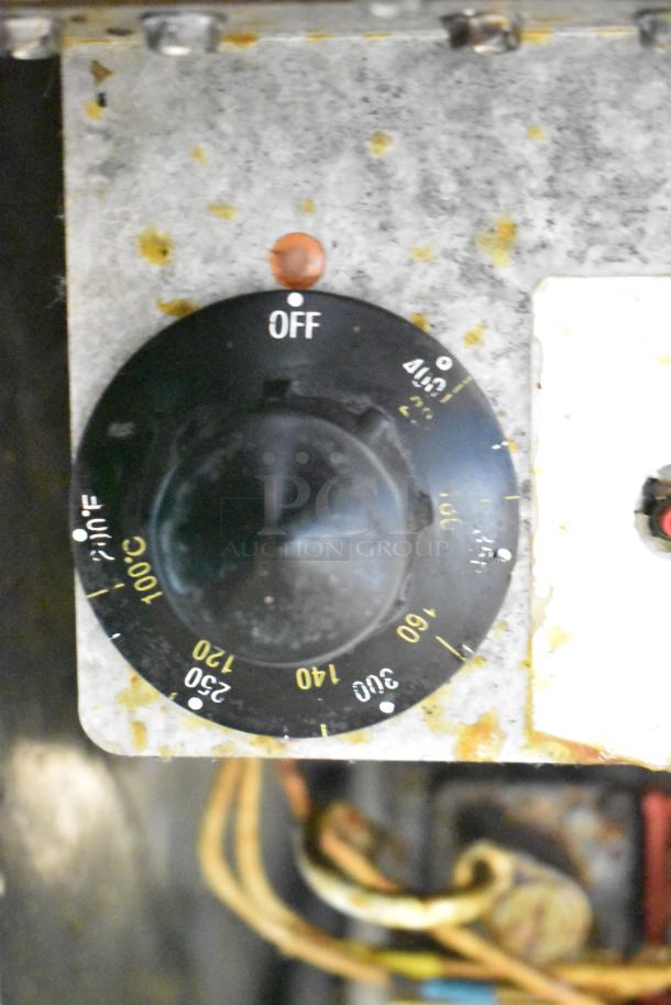 Pitco Frialator SG14-S fryer control dial, showing temperature settings up to 400°F. Some wear visible on the markings.
