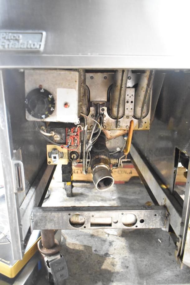 Pitco Frialator SG14-S commercial deep fat fryer, 2 bay, 110,000 BTU, visible controls, and internal components. Fair condition.