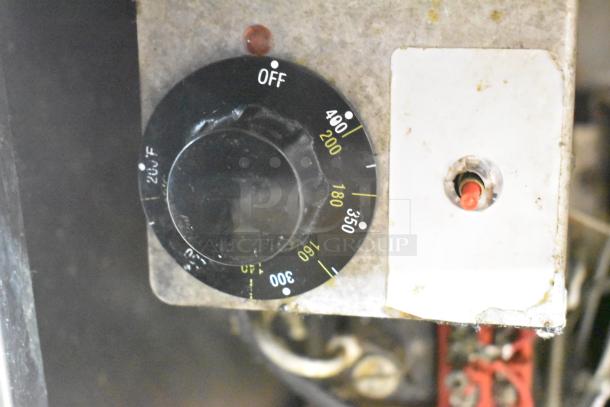 Pitco Frialator SG14-S dial showing temperature settings. Visible wear, dual control setup for commercial deep fryer.