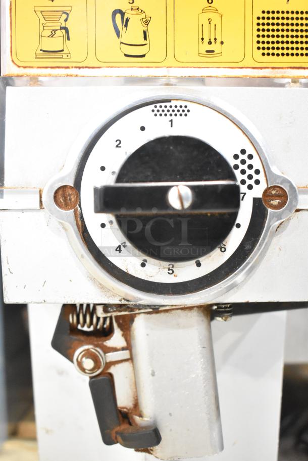 Mahlkonig K32S10 coffee grinder, stainless steel, visible grind settings dial, 115V, 1 Phase, used condition.