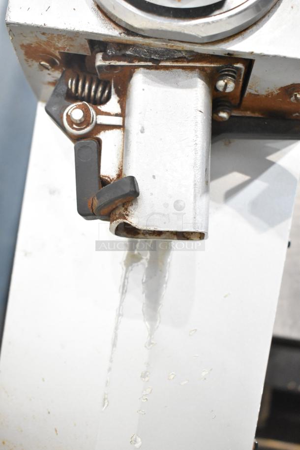 Mahlkonig K32S10 commercial coffee grinder, visible wear and rust on metal components, designed for 115V, 1 phase.