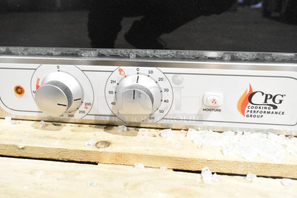 Cooking Performance Group electric convection oven control panel, model 351COFT4M, shows moisture injection feature. Broken glass visible.