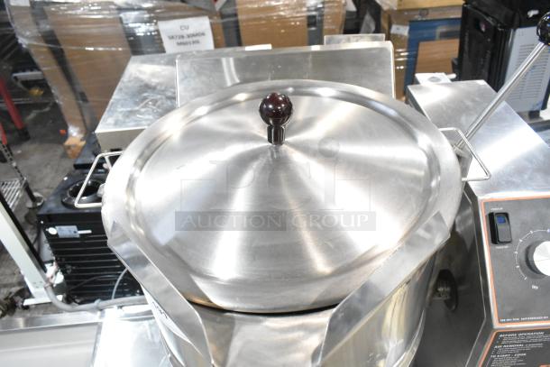 Groen TDH-48C 12-gallon steam kettle with manual tilt, stainless steel finish, and 52,000 BTU natural gas power.