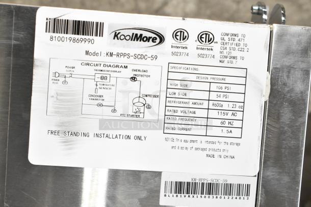 Brand new KoolMore KM-RPPS-SCDC-59 commercial refrigerated rail label. Model, voltage, PSI, refrigerant details shown.