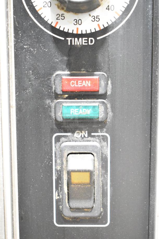 Control panel of Groen HY-3E HyPer Steam Cabinet, featuring dials for "Timed," "Clean," "Ready," and an "On" switch.