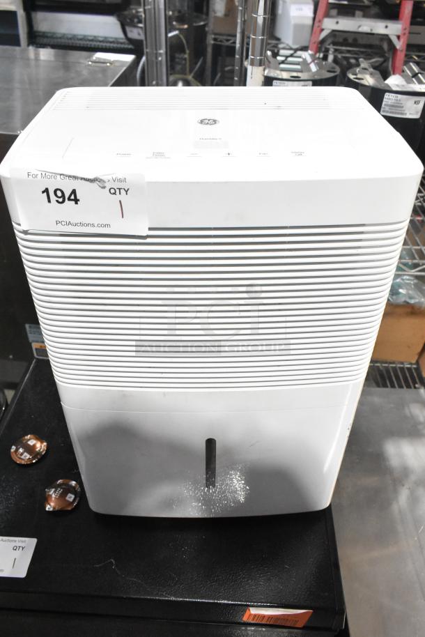 2018 GE ADEL30LWQ1 Dehumidifier, 115V, 1 Phase, white, with humidity controls, used condition, minor surface marks.