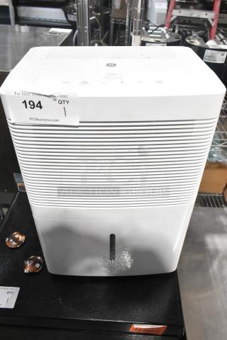 2018 GE ADEL30LWQ1 Dehumidifier, 115V, 1 Phase, white, with humidity controls, used condition, minor surface marks.