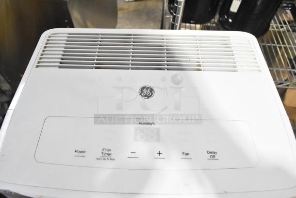 2018 GE ADEL30LWQ1 dehumidifier, 115V, 1 phase. Features control panel with power, filter timer, fan, and delay settings.