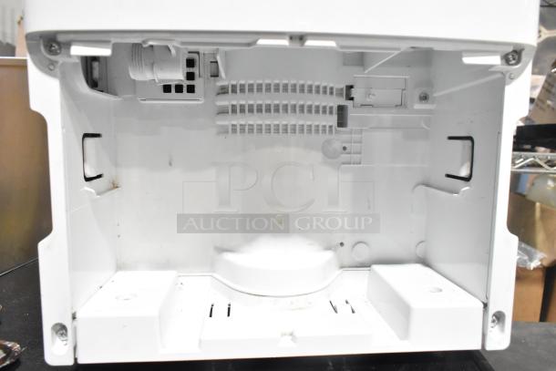 2018 GE ADEL30LWQ1 dehumidifier inner compartment, showing vented design, minimal wear, 115 volts, 1 phase.