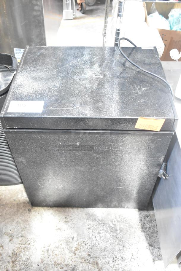 Electactic BD-50 Chest Freezer, black, 115V, 1 Phase, showing surface wear, labels, and power cord visible.